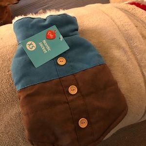 Brand new never worn. Too small for my dachshund.